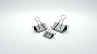 Three metal binder clips with black handles isolated on white background, ready for office and design use on packaging and marketing materials.