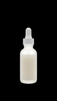 Clear glass dropper bottle filled with milky white liquid, isolated on transparent background, ready for cosmetics, skincare, essential oils, serums, and wellness product designs for packaging, labels, and print-on-demand applications.