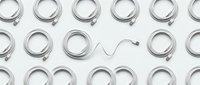 White USB-C charging cables arranged in organized rows on clean background. Modern technology accessories for smartphones, tablets, laptops connectivity.