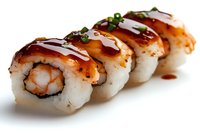 Fresh sushi rolls with grilled eel, shrimp, rice, and drizzled teriyaki sauce garnished with green onions on white background, close up view of Japanese cuisine.