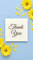 Thank you card with yellow daisy flowers and scattered petals on a soft blue linen background, elegant script lettering for greeting design.