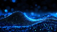 Glowing blue particles form dynamic wave pattern against dark background, creating futuristic digital landscape with bokeh light effects and depth perspective.