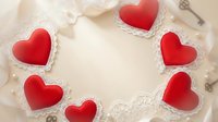 Red heart-shaped cookies with white lace doilies arranged in circle on light wooden background for Valentine's Day baking and romantic celebration concepts.