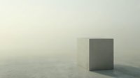 Minimalist concrete cube standing alone in foggy environment creates atmospheric mood with soft diffused light and mysterious ambiance.