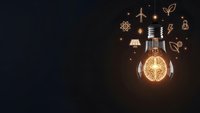 Glowing lightbulb with eco-friendly icons on dark background representing green energy, sustainability and environmental innovation for business presentations.