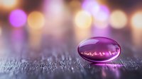Purple gemstone on textured surface with colorful bokeh lights background for jewelry design and luxury product photography.
