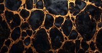 Cracked black marble surface with golden veins creating an abstract pattern, suitable for backgrounds, textures, and luxury design projects.