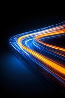 Dynamic light trails curve through dark background creating glowing blue and orange streaks, suggesting high-speed motion and technological advancement.