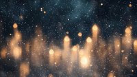 Magical glowing golden bokeh lights floating against dark starry night sky background creating dreamy atmospheric effect. Suitable for festive designs.