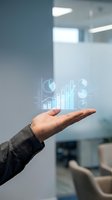 Businessman holding glowing holographic data analytics charts and graphs in palm, displaying financial growth metrics and business intelligence in modern office environment.