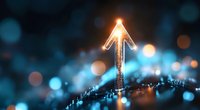 Glowing upward arrow symbol on dark background with blue bokeh lights and shallow depth of field, representing growth, success and future direction.