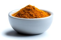 Ground turmeric powder in white ceramic bowl on white background. Bright orange-yellow aromatic spice used in Asian cuisine and natural medicine.
