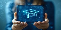 Glowing graduation cap hologram floating above digital tablet held in hands against blue background, representing online education and future learning.