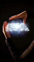 Two hands holding glowing digital planet with cosmic energy and light effects against dark background. Concept for technology, innovation, global connectivity, and future vision.