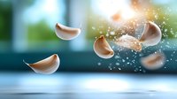 Floating eggshells with water droplets and splashes against blurred turquoise background create dynamic composition showing lightness and natural movement.