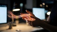 Professional businesswoman cupping hands with glowing energy light trails in modern office environment for innovation and technology concepts.