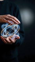 Hands protecting glowing energy sphere with light trails representing innovation, technology protection, and digital transformation concepts.