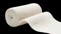 Rolled and unrolled gauze bandage isolated on transparent background, ready for medical, healthcare, and first aid design projects, clipart, and print materials.