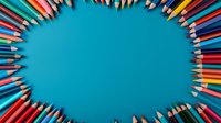 Colorful wooden pencils arranged in oval frame shape on turquoise background with copy space in center, creative education and art supplies layout for design.