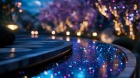 Magical evening pool scene with sparkling blue water reflecting colorful lights from illuminated trees creating dreamy bokeh atmosphere for luxury resort marketing.