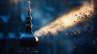 Orthodox church dome silhouette against dramatic sky with sunbeam breaking through clouds, creating mystical atmospheric scene at sunset. Religious architecture detail.