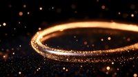 Glowing golden light ring with sparkling particles and bokeh effects on dark background creates magical atmosphere for festive designs and celebrations.