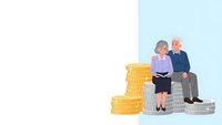 Senior couple planning retirement finances sitting on stacks of coins reviewing documents for future security and investment strategies.