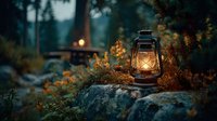 Vintage oil lantern glowing warmly on forest rocks during twilight camping adventure with cozy campfire background for outdoor recreation content.