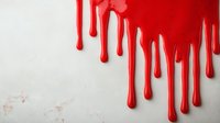 Red paint drips flowing down white wall creating dramatic contrast and texture effect, abstract background pattern for creative design projects and artworks.