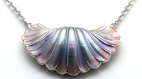 Iridescent seashell pendant necklace with silver chain featuring holographic mother of pearl effect and scalloped design on white background, isolated jewelry piece.