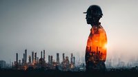 Industrial worker silhouette with oil refinery double exposure at sunset showcasing petroleum engineering and energy sector manufacturing operations.