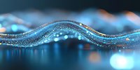 Shimmering blue wave with glitter particles and bokeh effect creates dynamic flowing motion against dark background, macro photography style composition.