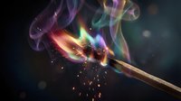 Burning match with colorful smoke and sparks creating magical flame effect on dark background for creative design projects.