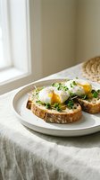 Poached eggs with runny yolk on avocado toast garnished with microgreens served on white plate for healthy breakfast or brunch meal.
