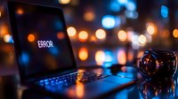 Laptop displaying error message with coffee cup in dark setting illuminated by ambient bokeh lights, creating moody atmosphere for technology and work concepts.