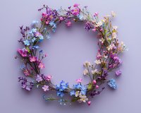 Delicate floral wreath with pink, blue and purple wildflowers arranged in circular composition on soft lilac background, spring botanical arrangement.