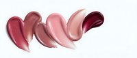 Cosmetic lipstick smears in pink and red tones isolated on white background for beauty and makeup design projects.