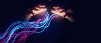 Hands protecting glowing energy streams with flowing light trails in purple and blue colors on dark background for healing and spiritual concepts.