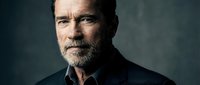 Middle-aged Caucasian man with gray beard and short hair wearing dark shirt against neutral background, suitable for corporate, business, professional portraits, and leadership concepts.