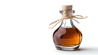 Small round glass bottle with cork stopper and twine bow containing amber liquid on white background, isolated product photography for beverage and spirits marketing.