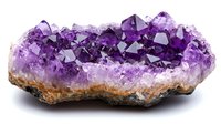 Raw amethyst crystal cluster with deep purple crystalline formations on natural brown matrix base, displaying geometric shapes and varying translucent purple hues against white background.