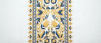 Ornate golden floral border with decorative leaves and scrollwork on light background for luxury design projects and elegant branding materials.