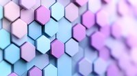 Geometric hexagonal background in soft pastel blue and pink colors creating depth effect with selective focus and blur. Modern abstract pattern for tech designs.