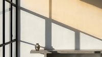 Minimalist interior scene with ceramic vase on wooden shelf casting geometric window shadows on neutral wall for modern home decor and design projects.
