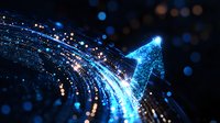 Glowing blue arrow formed by luminous particles and light trails curves upward against dark background with bokeh effect, representing growth and progress.