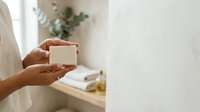 Hands holding blank white box for product packaging mockup, branding, and retail display purposes.