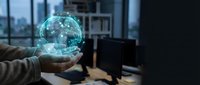 Businessman holding glowing digital globe with network connections in modern office workspace, representing global business, technology innovation, and worldwide digital connectivity.