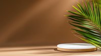 Minimal product display platform with palm leaf shadow on beige background. Round white ceramic podium for cosmetic presentation creates modern composition.
