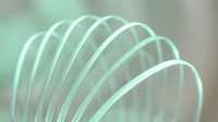 Translucent spiral coil spring with soft mint green tones, isolated on blurred neutral background, suitable for design projects and product mockups.