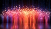 Glowing fiber optic lights create magical forest reflection on water surface with vibrant orange, pink and purple colors against dark background.